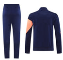 BARCELONA FATO DE TREINO 2526 – UNISSEX  AZUL MARINHO E LARANJA