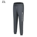 CALÇA CASUAL UNDER ARMOUR HOMEM - CINZA