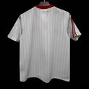 CAMISOLA MANCHESTER UNITED X ADIDAS ORIGINALS ICON BRANCA 25 26 - HOMEM