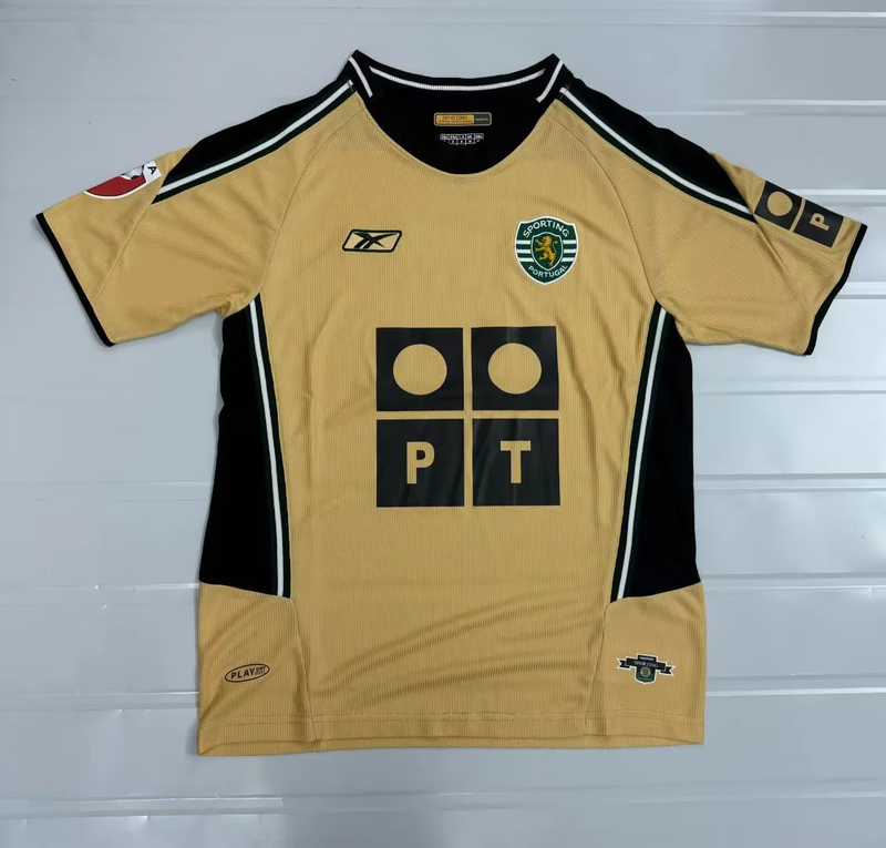 CAMISOLA SPORTING CP ALTERNATIVA II 03/04 – RETRO MASCULINA DOURADA REEBOK