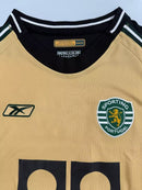CAMISOLA SPORTING CP ALTERNATIVA II 03/04 – RETRO MASCULINA DOURADA REEBOK