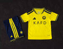 CAMISOLA AL NASSR PRINCIPAL 26/27 CONJUNTO INFANTIL