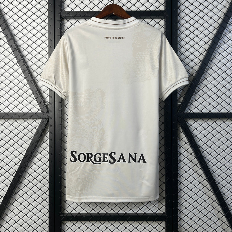 Camisola Napoli II 25/26 – Equipamento Alternativo Branco com Dourado