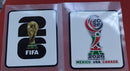 Patch Mundial 2026 FIFA – Kit 2 Badges Copa do Mundo 2026 Fornecedor