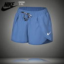 SHORT NIKE MULHER - AZUL